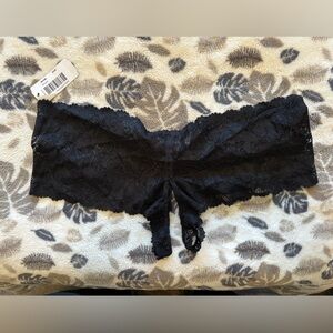 NWT black cheeky crotchless panty by Escante